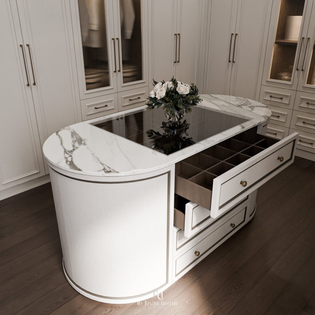 walk-in closet พร้อม island กลางห้อง หน้าท็อปหินและลิ้นชักเก็บของ